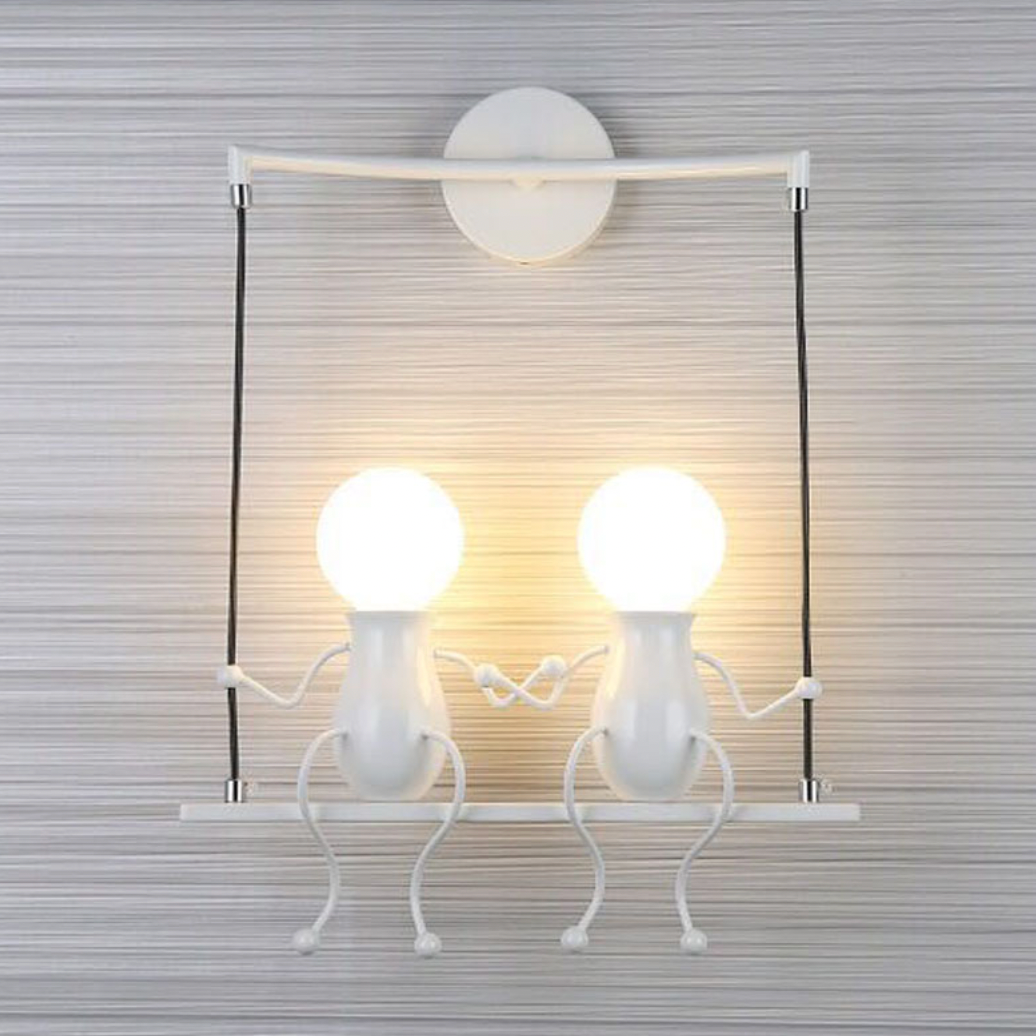 SwingLumi – LED wandlamp "Man op schommel"