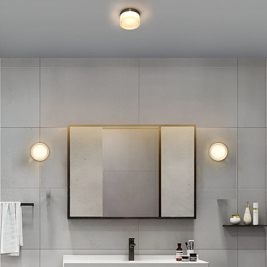 Amberlo | Ronde Wandlamp van Geribbeld Glas – Amber & Wit