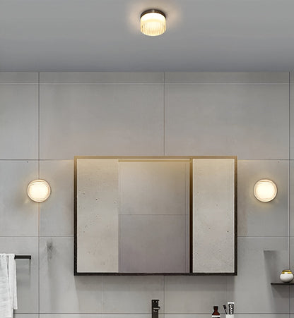 Amberlo | Ronde Wandlamp van Geribbeld Glas – Amber & Wit