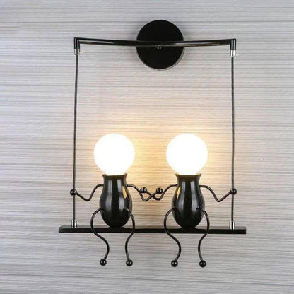 SwingLumi – LED wandlamp "Man op schommel"